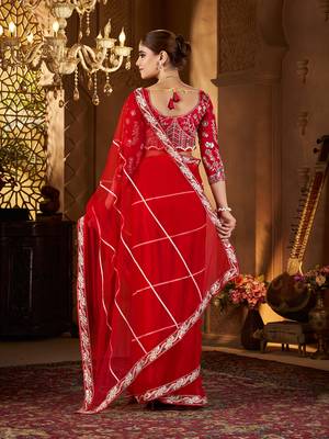 Red net embroidery work saree with unstitched blouse piece 4