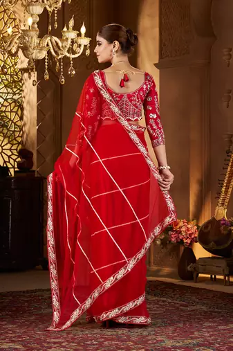 Red net embroidery work saree with unstitched blouse piece