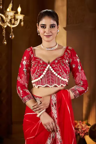 Red net embroidery work saree with unstitched blouse piece