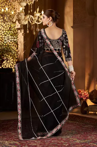 Black net embroidery work saree with unstitched blouse piece