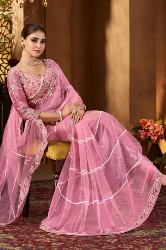 Pink net embroidery work saree with unstitched blouse piece