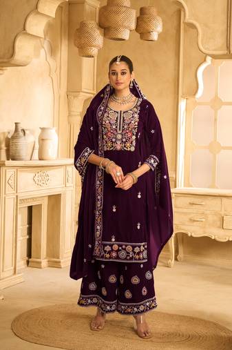 Purple embroidered velvet semi-palazzo style salwar suit