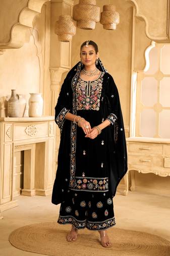 Black embroidered velvet semi-palazzo style salwar suit