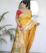 Yellow paithani silk blend saree with unstitched blouse