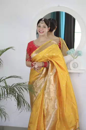 Yellow paithani silk blend saree with unstitched blouse