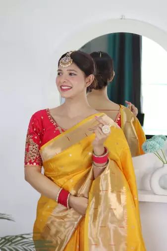 Yellow paithani silk blend saree with unstitched blouse