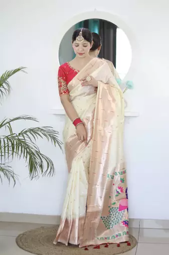 White paithani silk blend saree with unstitched blouse