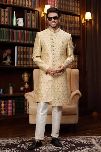 gold sherwani with imported jacquard silk and faux satin pajama for mens