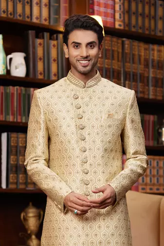 gold sherwani with imported jacquard silk and faux satin pajama for mens