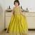 Yellow silk blend embroidered sleeveless party lehenga with shrug for girls