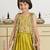 Yellow silk blend embroidered sleeveless party lehenga with shrug for girls