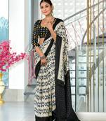 Black soft cotton block print saree with unstitched blouse piece