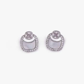 Classy round shape studded cz silver plated stud earring for women and girls 3