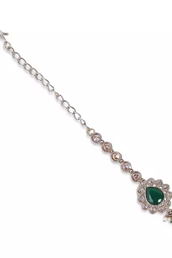 green stone kundan drop maang tikka in gold tone