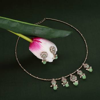 Delightful leaf and oval shape crystal gold plated matinee  for women and girls 1
