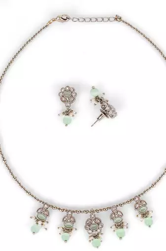 Delightful leaf and oval shape crystal gold plated matinee  for women and girls