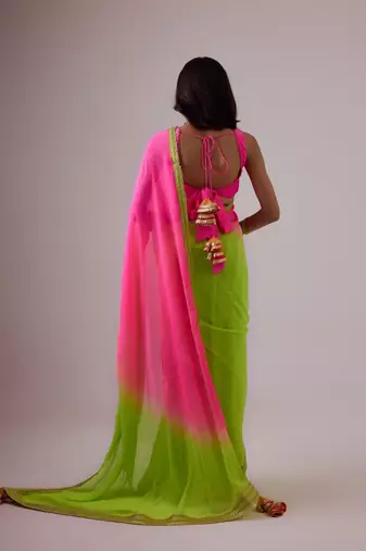 Pink and green plain silk saree with ombre pallu and gota lace border