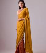 Yellow plain georgette saree with embroidered blouse