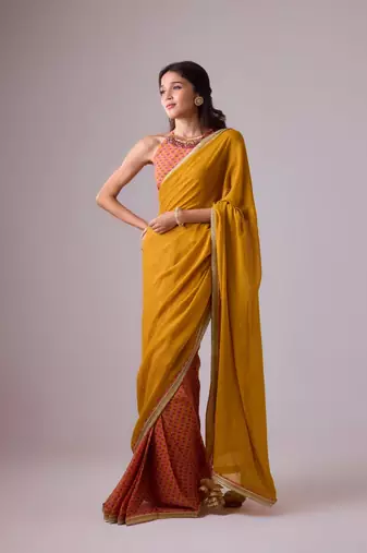 Yellow plain georgette saree with embroidered blouse