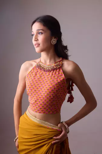 Yellow plain georgette saree with embroidered blouse