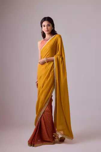Yellow plain georgette saree with embroidered blouse