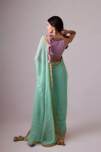 Blue plain georgette saree with coral gajjari printed pleats and embroidered blouse