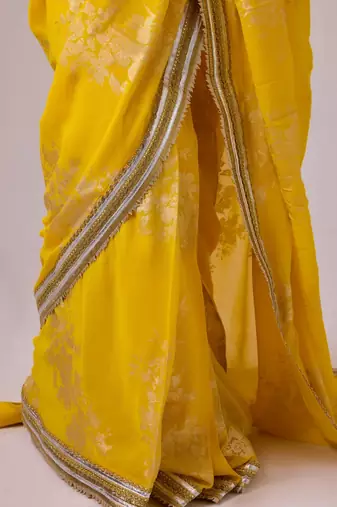 Yellow silk blend foil printed saree with gota work