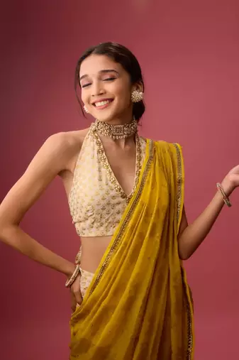 Yellow printed dhoti and saree