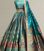 teal Flared Banarasi Woven Lehenga with Double Can Can