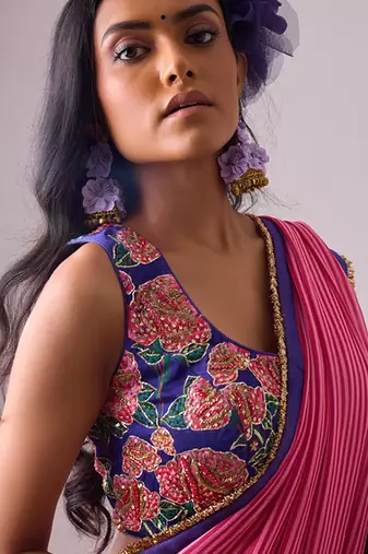 Pink georgette printed saree with embroidered blouse