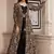 Black digital print faux georgette Palazzo suit set with crop top & shrug stitched