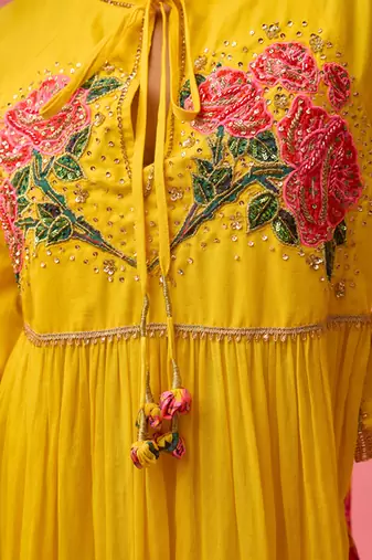 Yellow cotton floral embroidered kalidar paired with dupatta and churidar