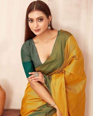 Yellow silk blend saree with contrast  blouse 4
