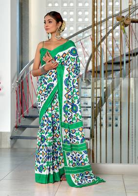 Teal mulcotton ikat block print saree with unstitched blouse piece 1