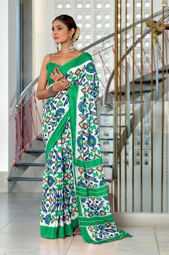 Teal mulcotton ikat block print saree with unstitched blouse piece