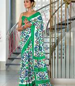 Teal mulcotton ikat block print saree with unstitched blouse piece