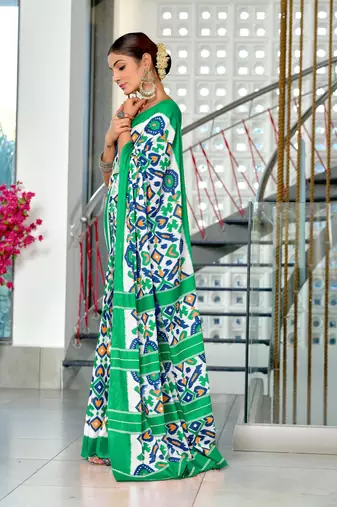 Teal mulcotton ikat block print saree with unstitched blouse piece