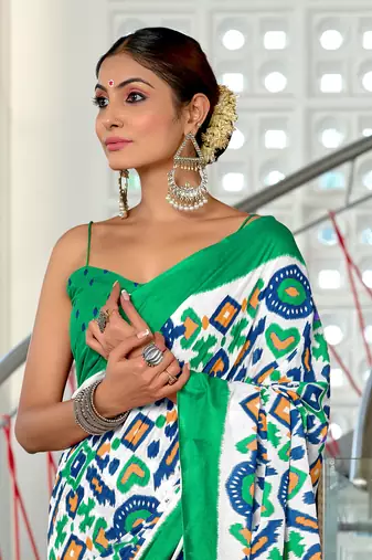 Teal mulcotton ikat block print saree with unstitched blouse piece
