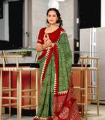 Green mulcotton hand print saree with unstitched blouse piece