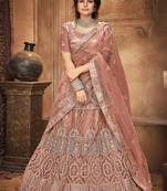 Peach Embroidered Stone Work Net semi stitched Lehenga choli