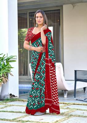 Teal mulcotton ikat print saree with unstitched blouse piece 1