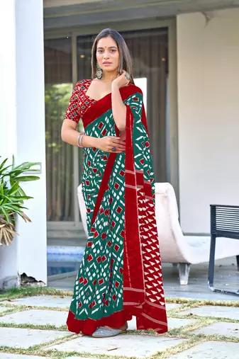 Teal mulcotton ikat print saree with unstitched blouse piece