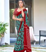 Teal mulcotton ikat print saree with unstitched blouse piece