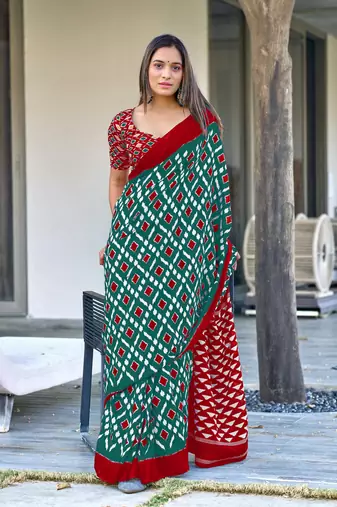 Teal mulcotton ikat print saree with unstitched blouse piece