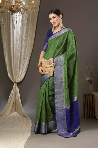 Green checks design silk blend saree with blouse piece