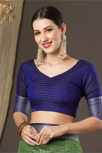 Green checks design silk blend saree with blouse piece