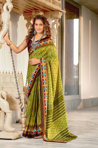 Green mulcotton ikat print saree with unstitched blouse piece