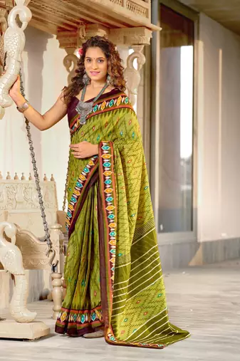 Green mulcotton ikat print saree with unstitched blouse piece