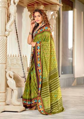 Green mulcotton ikat print saree with unstitched blouse piece 2