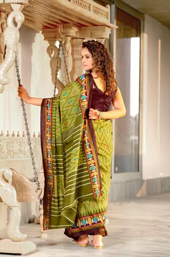 Green mulcotton ikat print saree with unstitched blouse piece